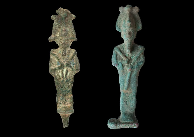 Archaeologists have discovered two ancient egyptian bronze figurines depicting osiris during excavations in the village of kluczkowice in opole lubelskie county, poland.